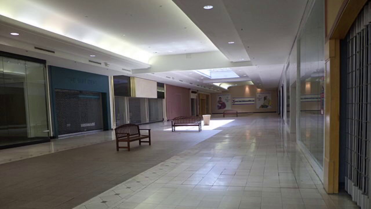 NCT U_7th Sense playing in an empty mall