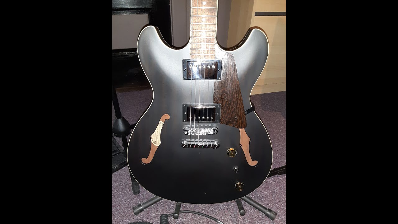 The Ibanez AS53, From "Cheap-To-Neat."