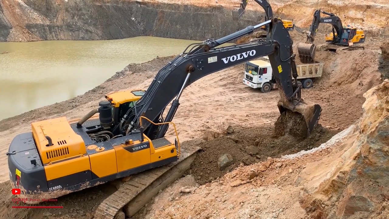 Impressing Volvo EC480DL Excavator Vs Shacman Trucks Moving Soils