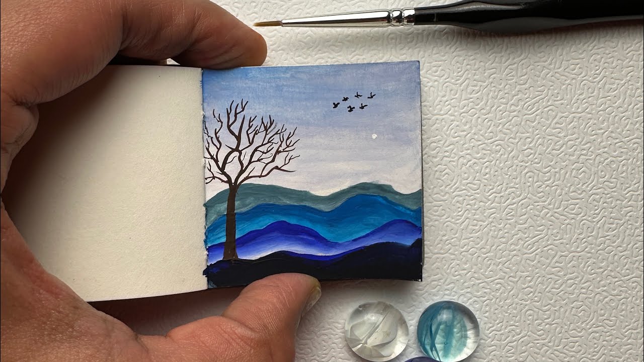 Serene landscape🏞️ on tiniest art book #easyacrylicpaintingforbeginners #naturepainting #viralvideos