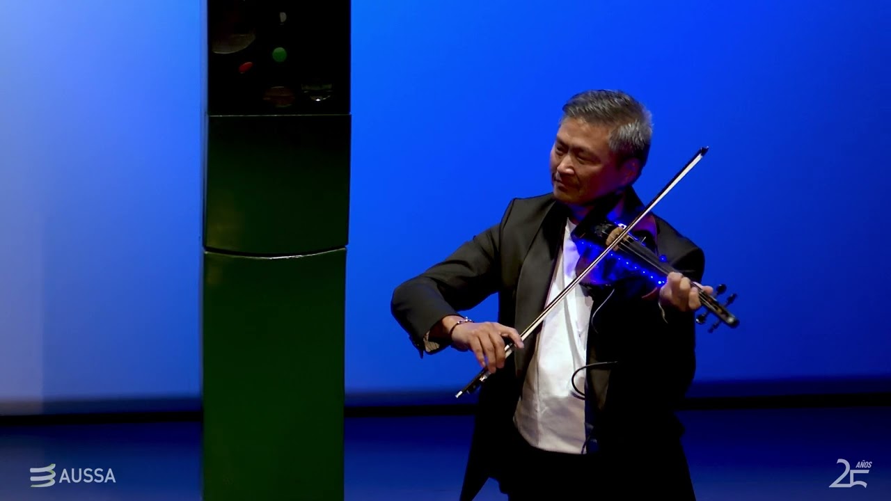 Introito al 25 aniversario de AUSSA para guitarra, violín, bailaor, tres parquímetros y una app