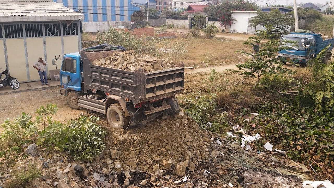Wow! Move On Stone Filling Up The Flood Land Project By Bulldozer Push Stone With Team Dump Trucks