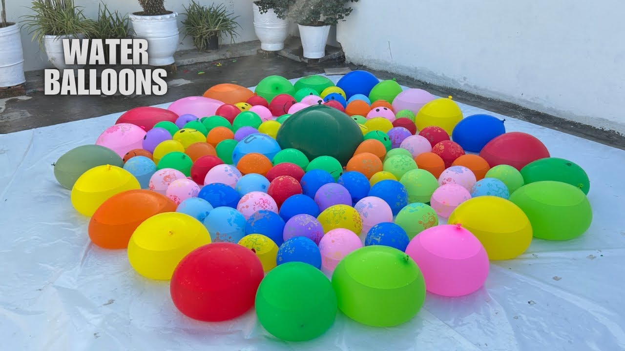 &iexcl;Globos de agua gigantes y globos con caras sonrientes explotando en mi cabeza!