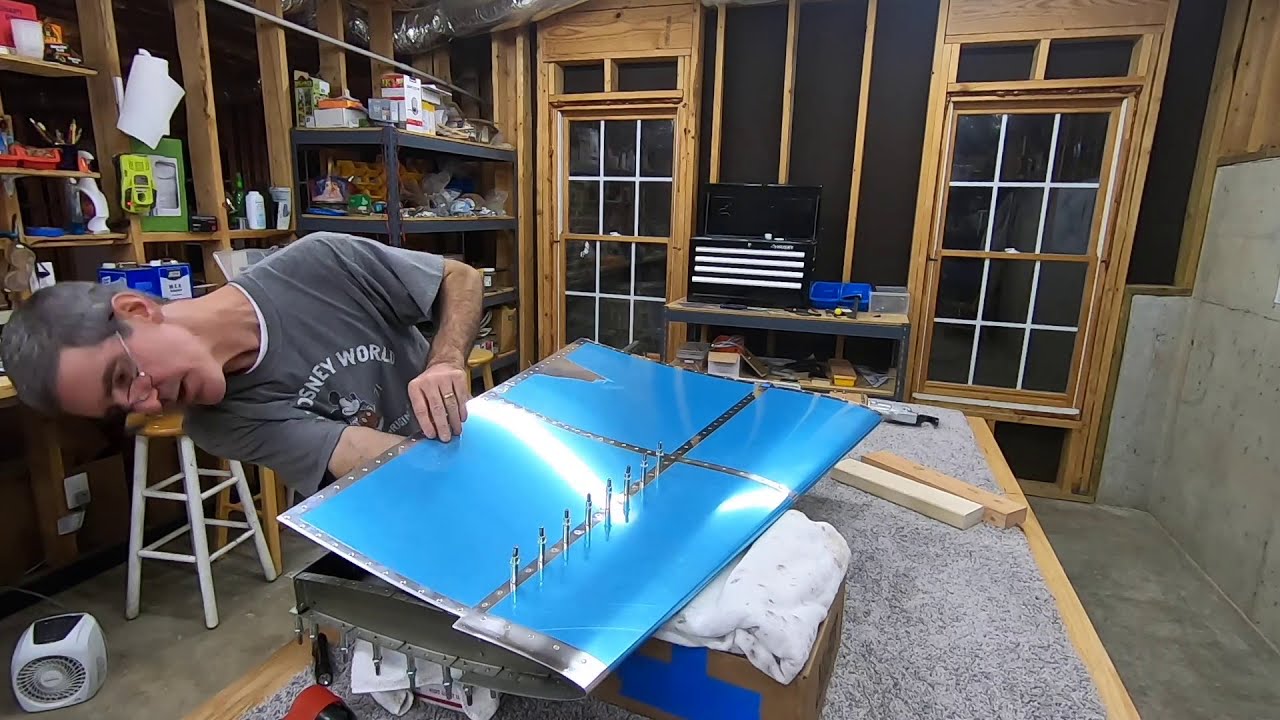 RV-10 Build Log - Emp 15 - Riveting the VS skin to the front spar