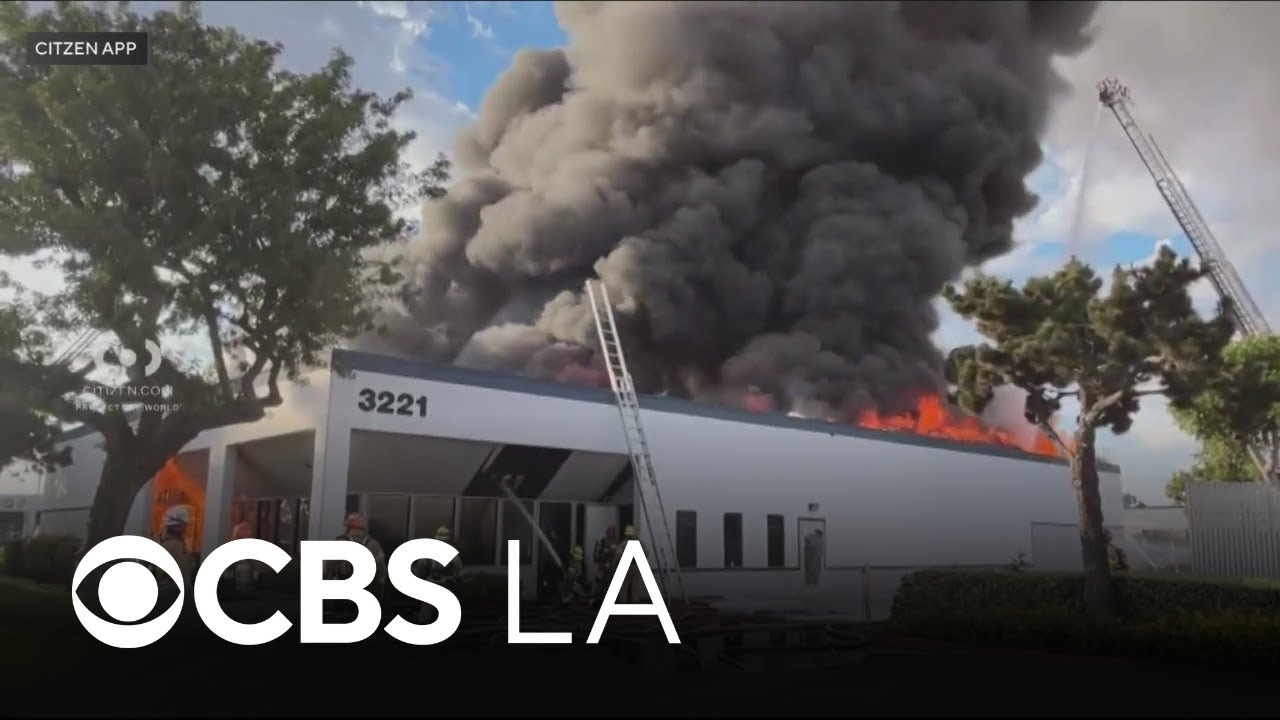 Orange County firefighters battle third-alarm blaze at commercial building