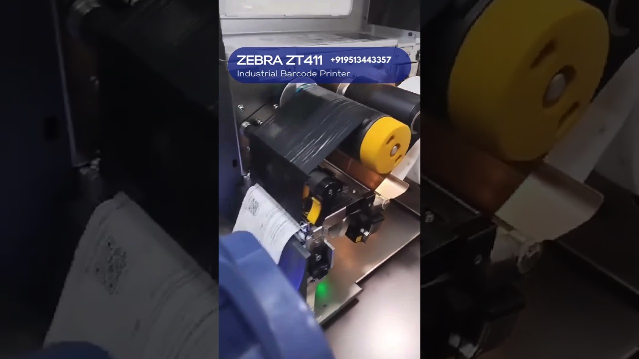 Zebra ZT411 Industrial Barcode label printer with auto rewinds. 
