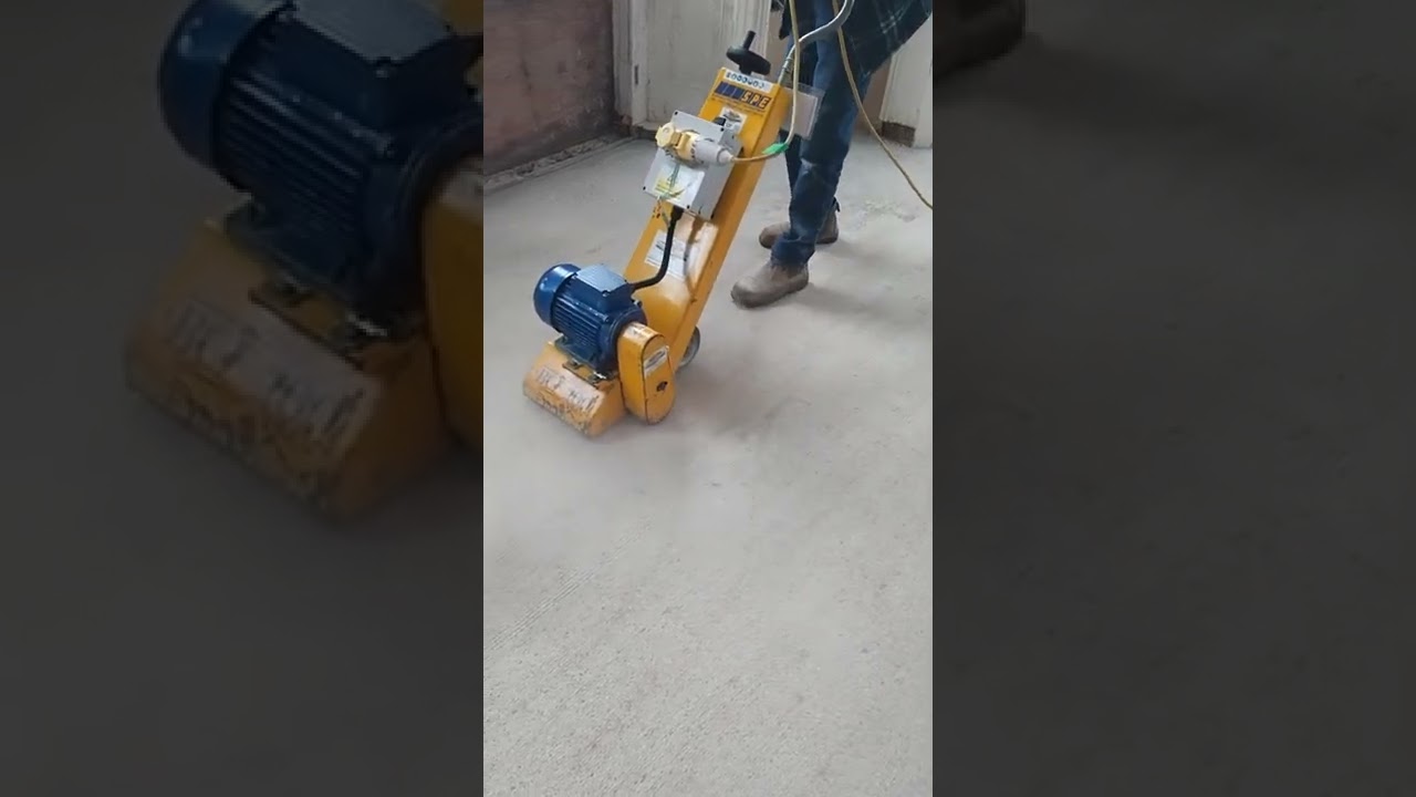 Bef200 110v floor scabbler fitted with tct cutters on screed floor reduction test run.