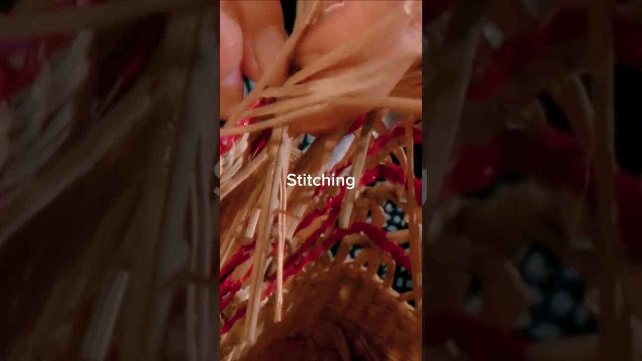 Artisans skillfully stitching straw bag, weaving tradition into every thread. #makingstrawbag