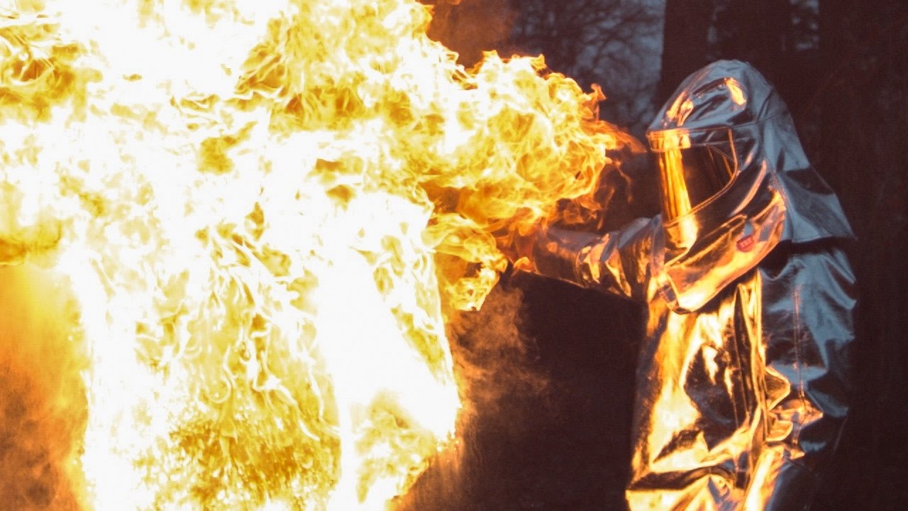 Water on burning oil in slow motion - 4K, 1.000 fps