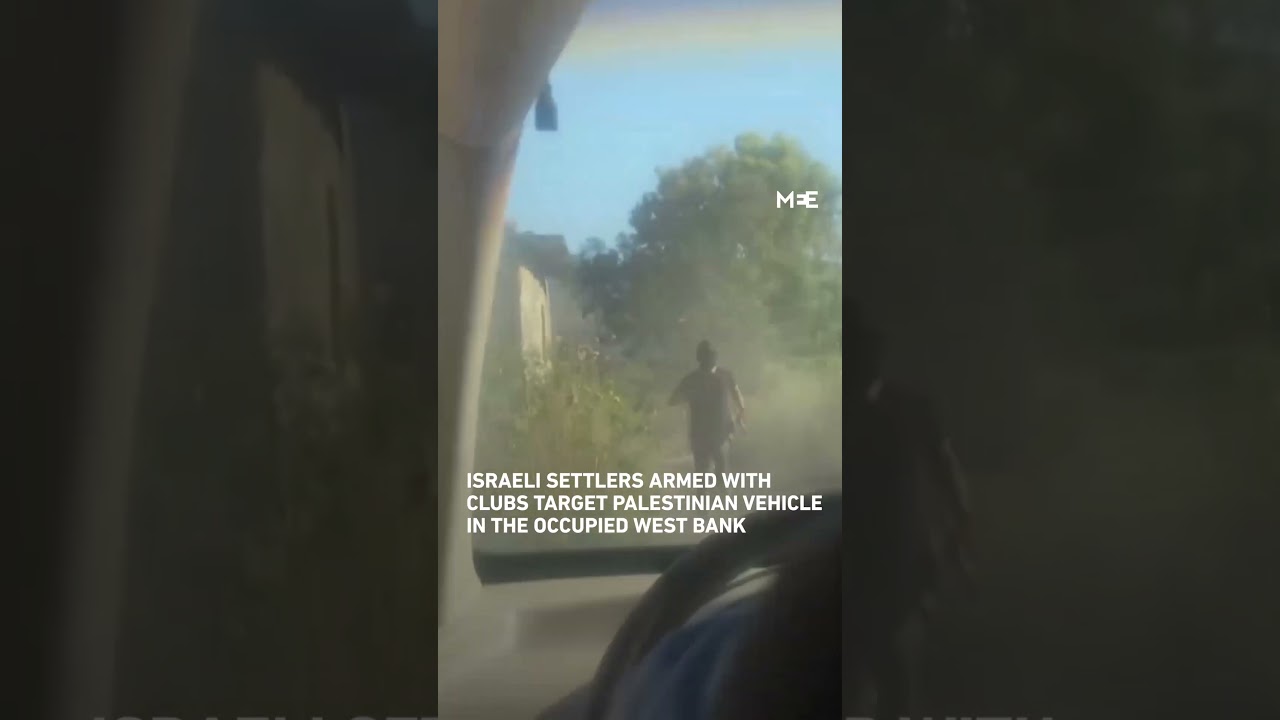 Israeli settlers armed with clubs target Palestinian vehicle in the occupied West Bank