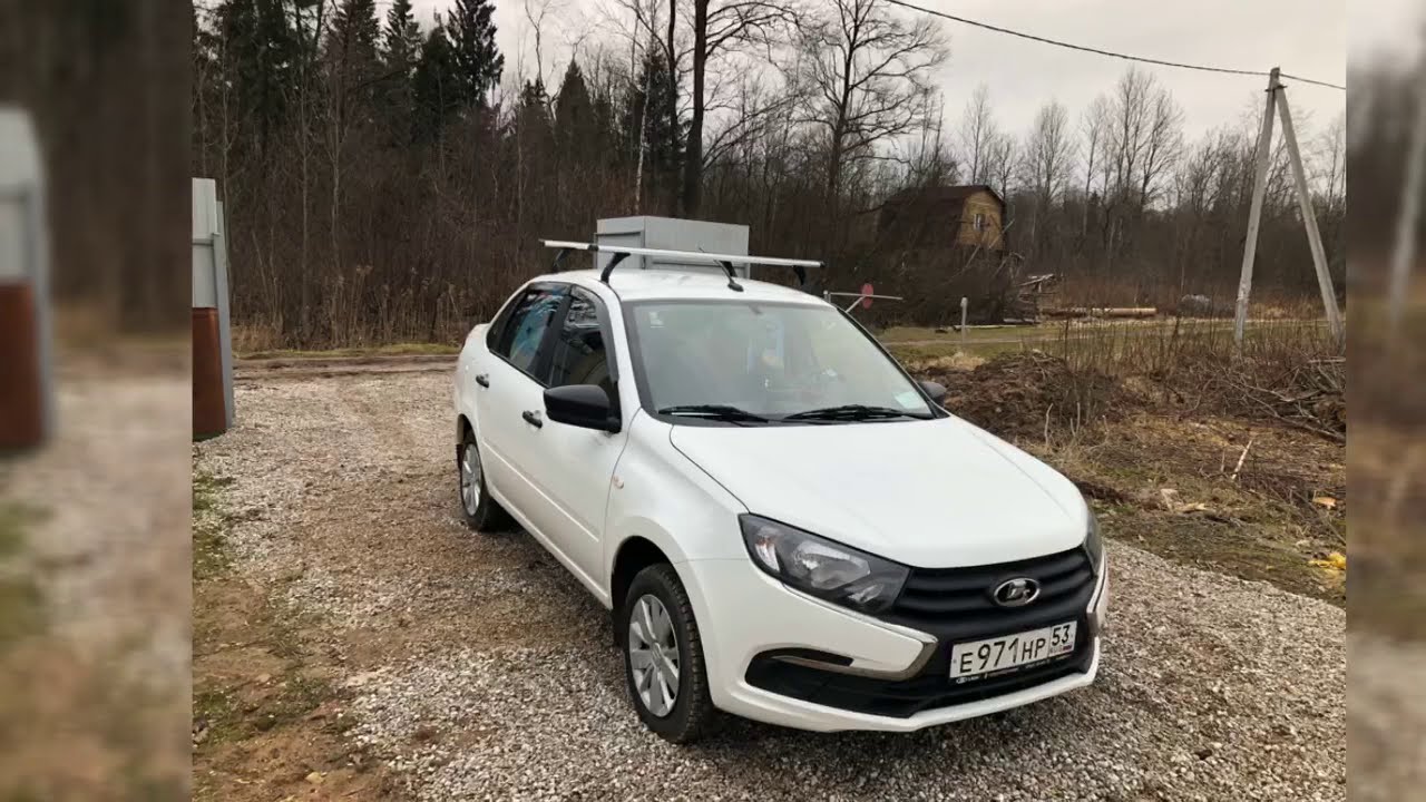 Покупка и установка багажника (шпалы) аэродинамические на крышу. Лада Гранта 2019 года.