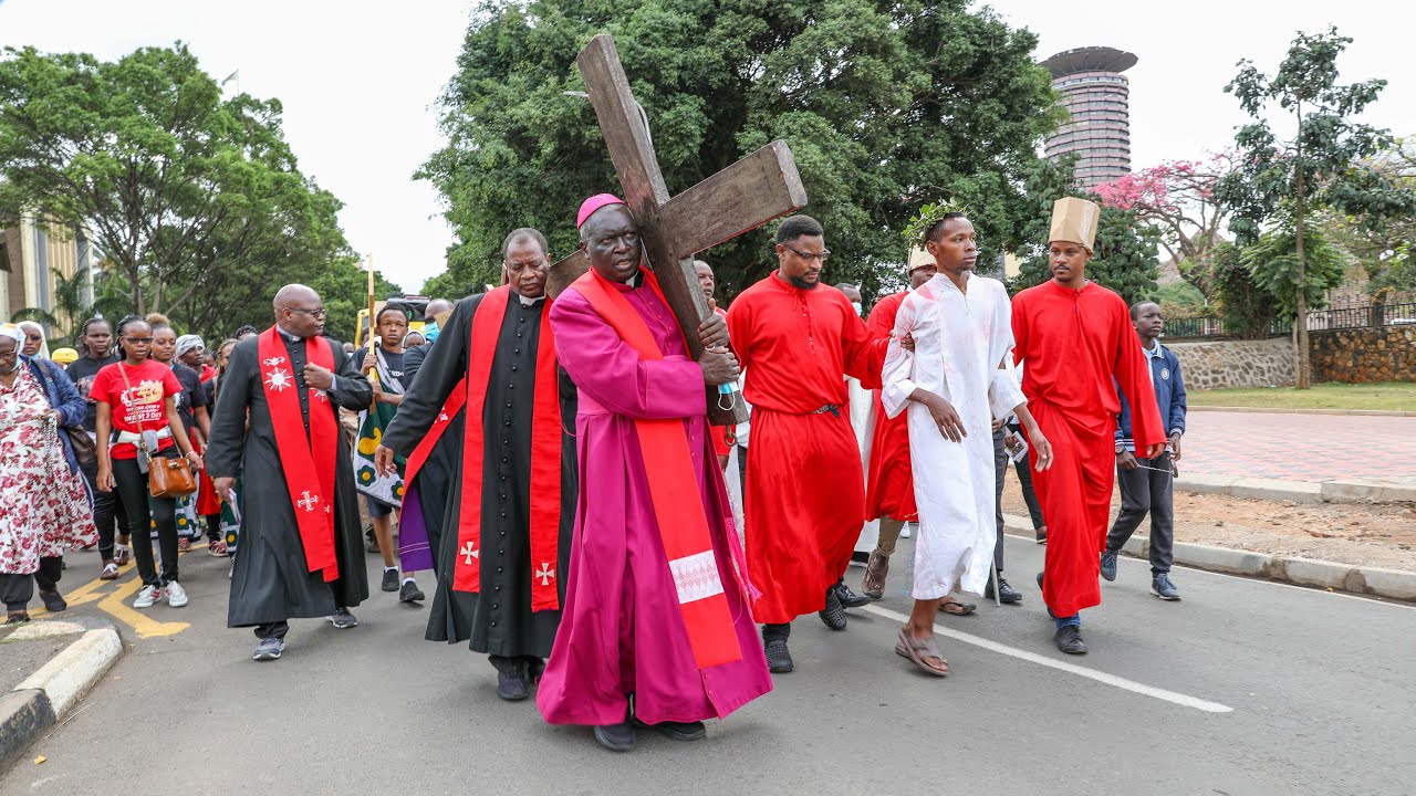 Archbishop Philip Anyolo leads the Way of the Cross.