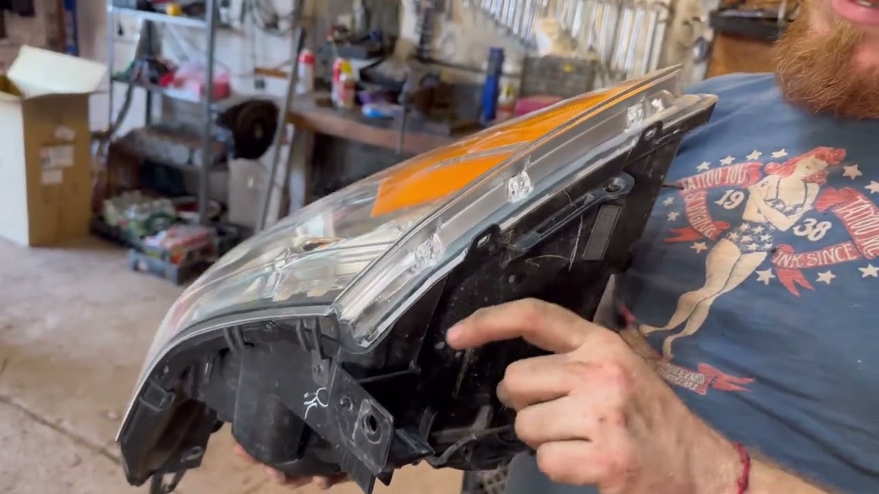 Headlamp/bumper replacement Cadillac SRX