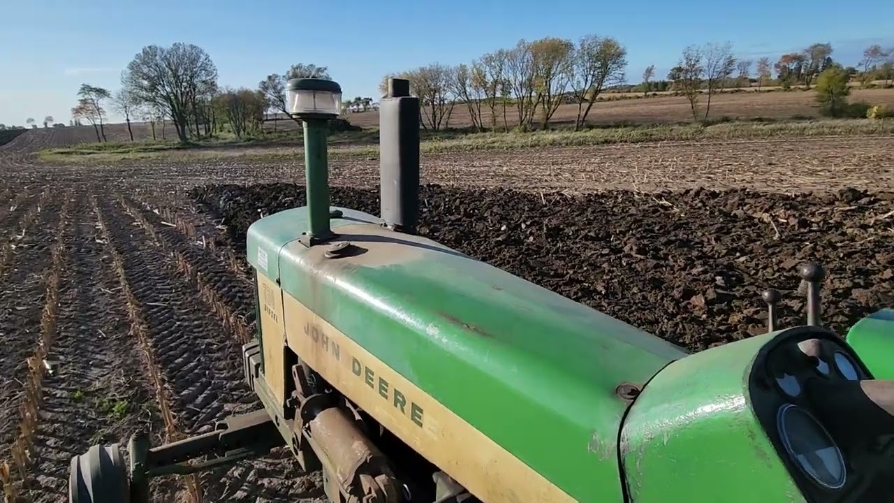 John Deere 730 Diesel 3 bottom roll over plow
