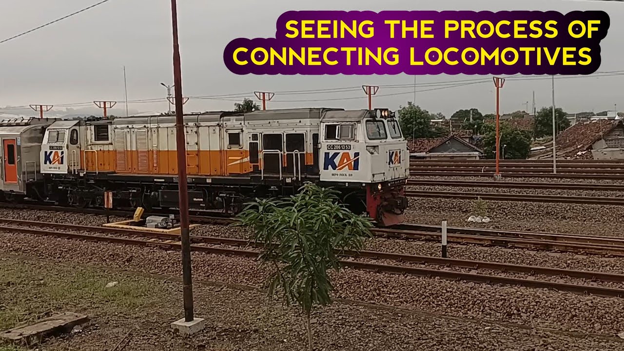 SEEING THE PROCESS OF CONNECTING LOCOMOTIVES AND RAILWAY CARRIAGES