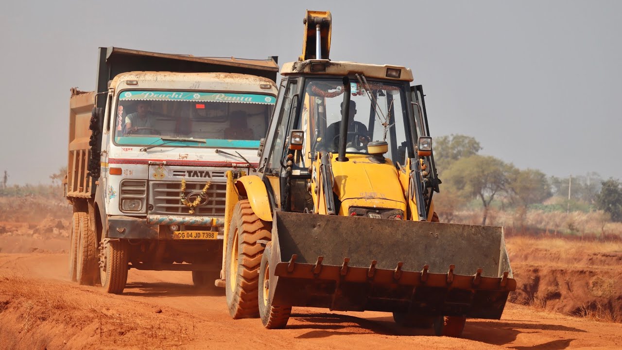 Kirloskar JCB 3dx Backhoe Loading Pond Murum in Tata 2518 Truck