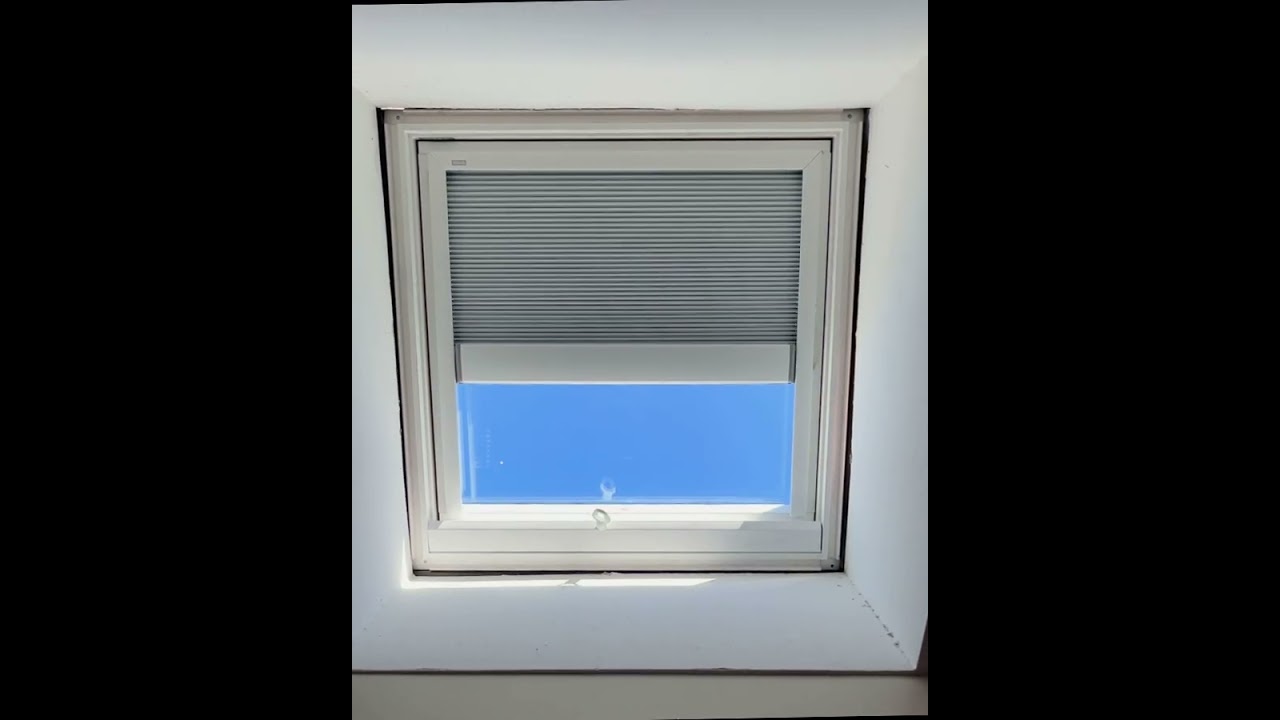 Velux VS with honeycomb solar powered blinds in action. 