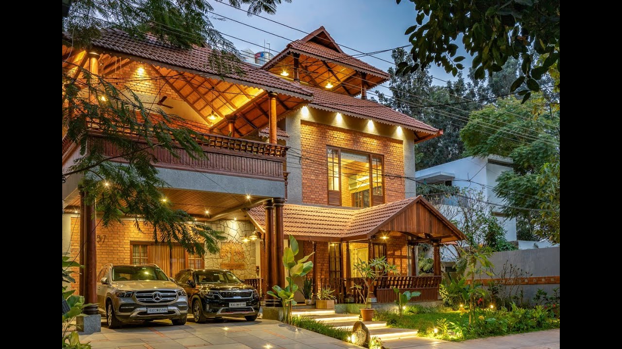 THANAL PART 1 - A LUXURY ETHNIC STYLE HOUSE WITH BRICK CLADDING AND KOTA FLOORING
