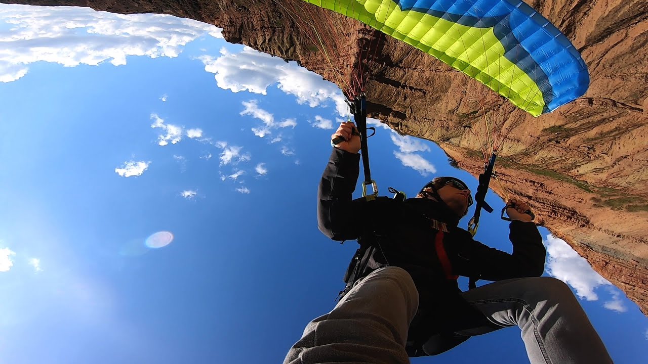 Extreme paragliding: Speed soaring the vertical cliffs of Praia da Gralha Portugal