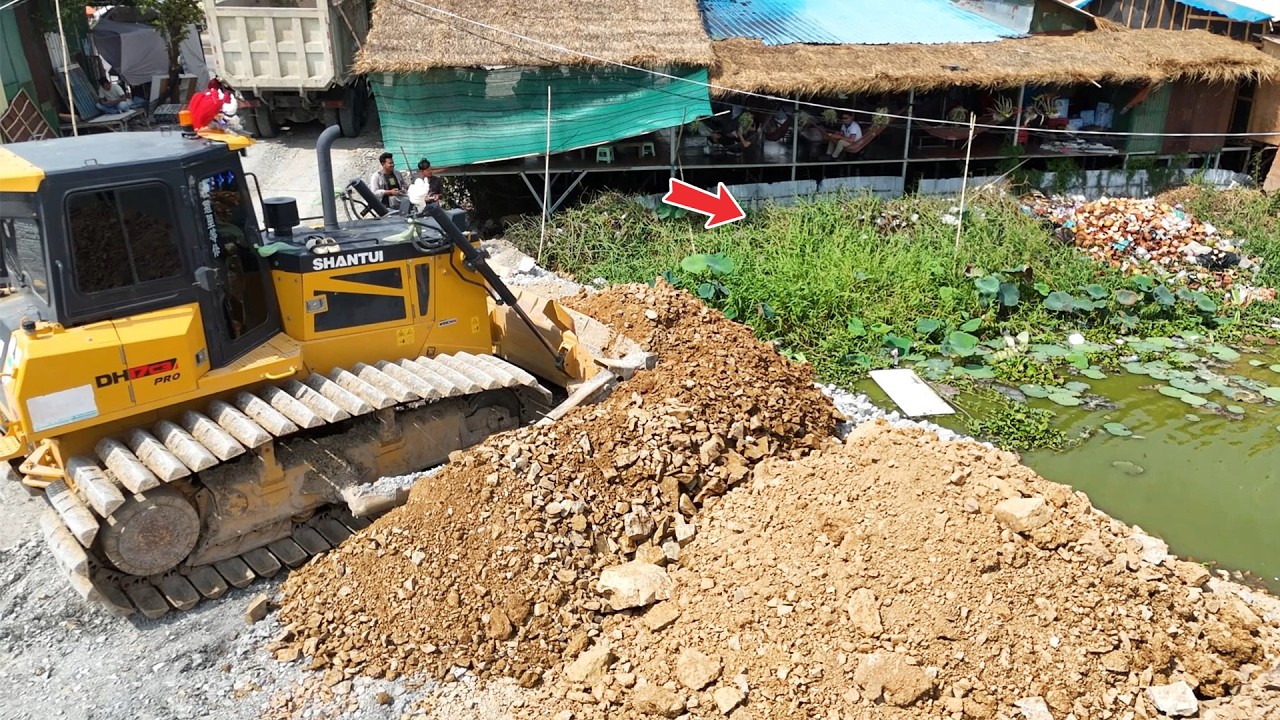 Excellent new fill by Powerful SHANTUI Dozer with Skills Dump truck drop stone fill flooded Region