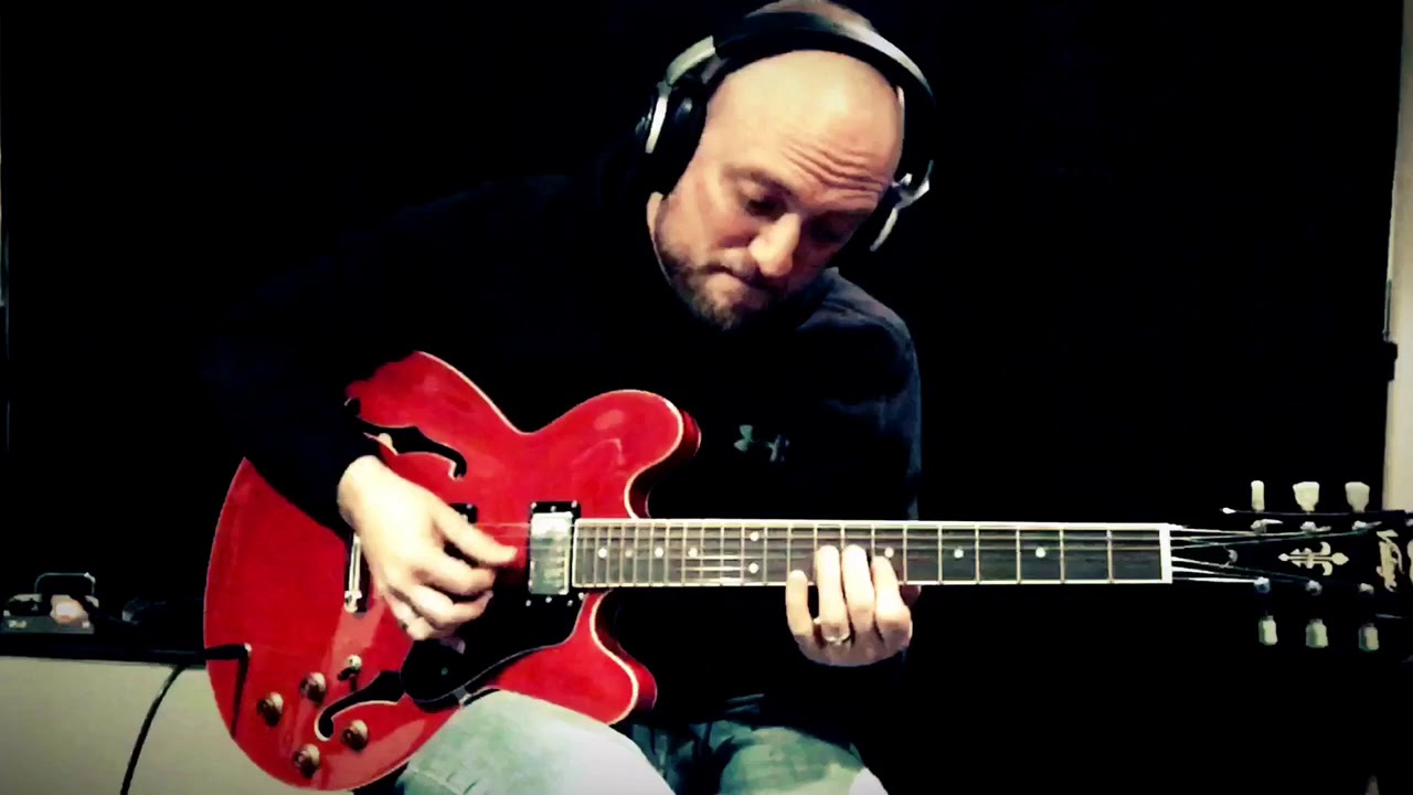 Playing my Vintage VSA-500 over “Slow Blues Backing Track in E” by RandomJammer