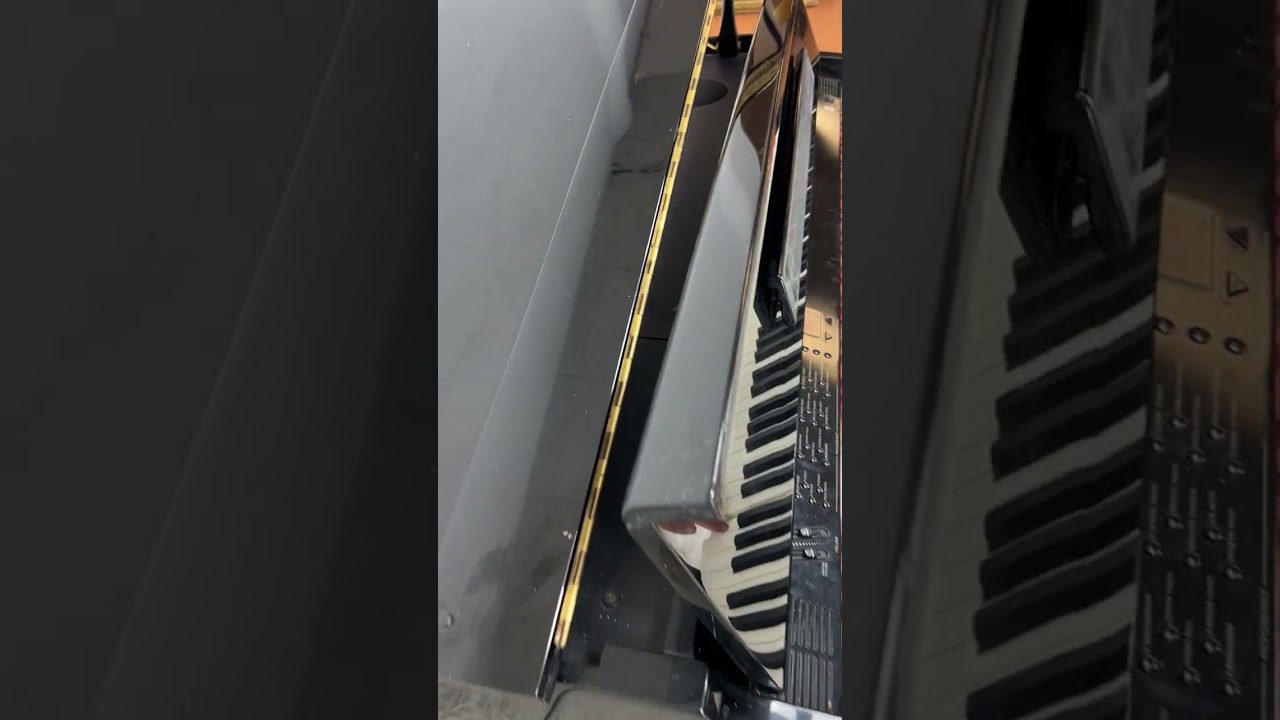 Lot 1215 Samick Electric Piano.  Black Lacquer Case.