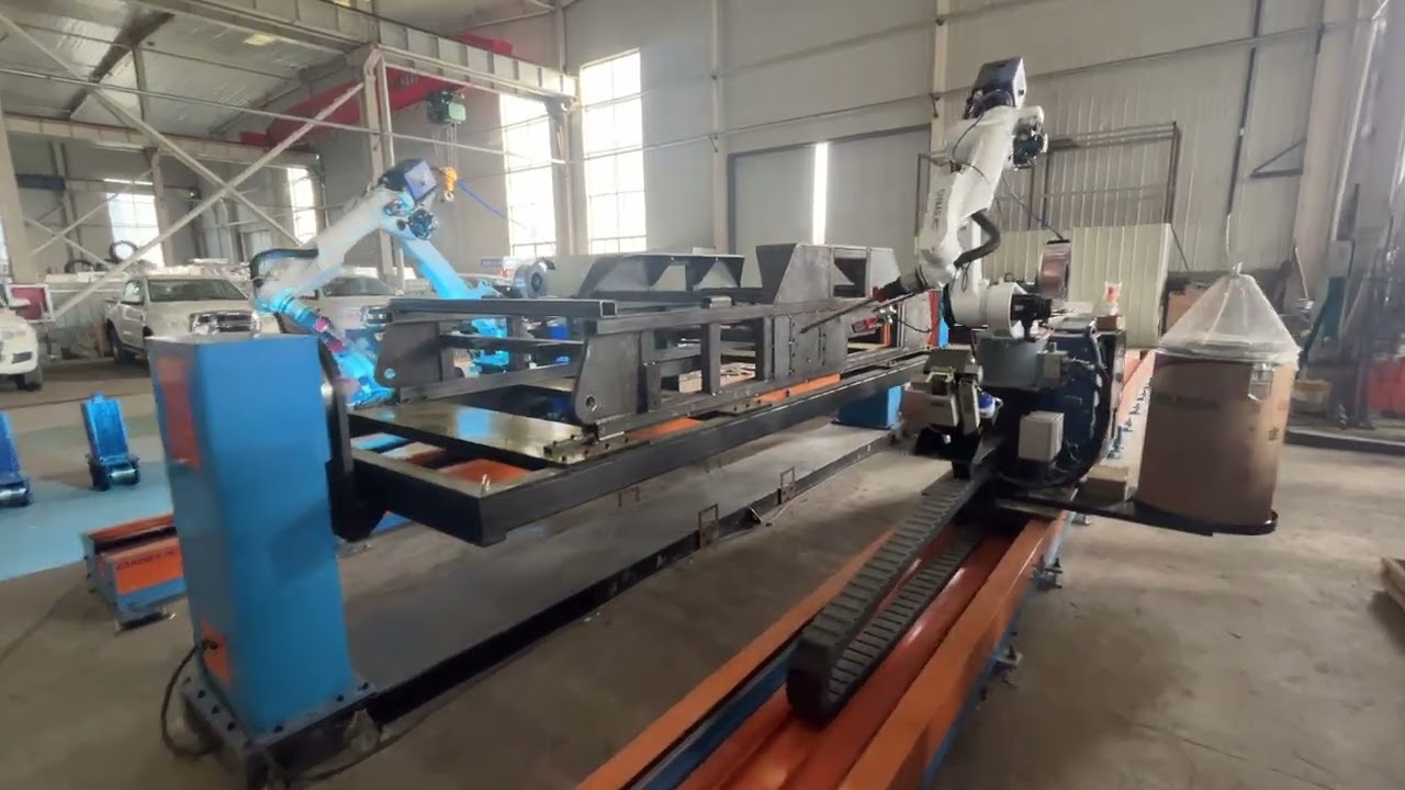 TWO program-free welding robots working on one same workpiece 2