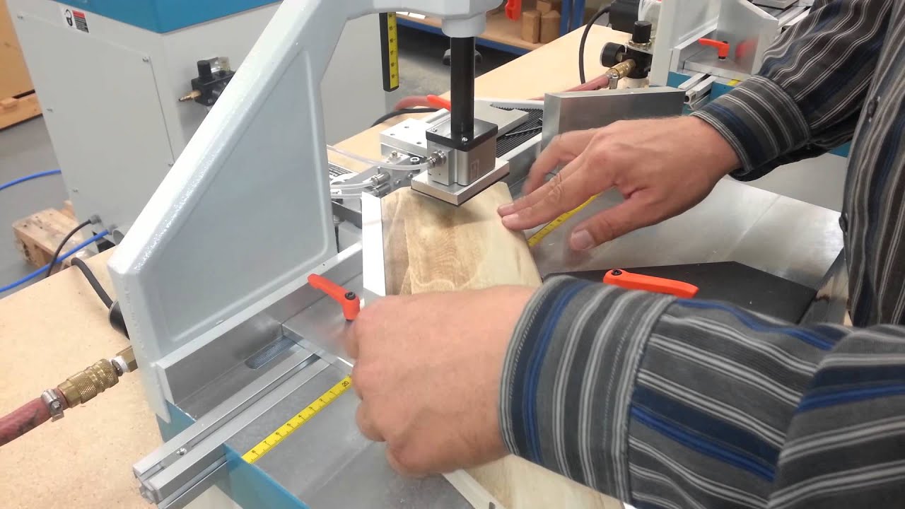 Joining large compound miters for casket lids on two Hoffmann MU2-P dovetail routing machines