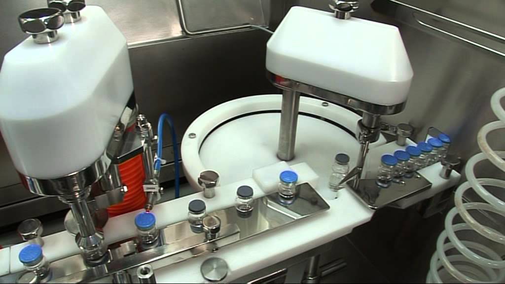 compact liquid filling line with isolators