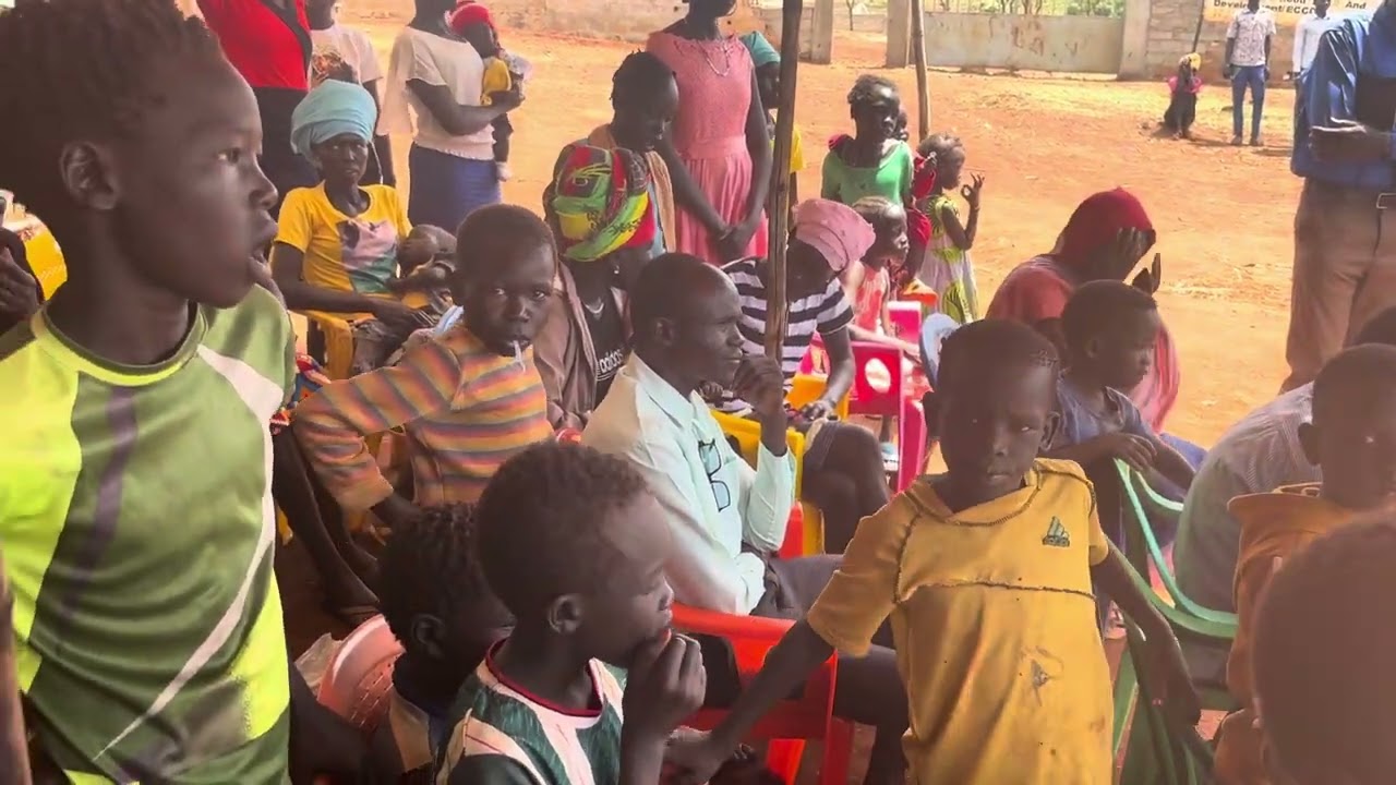 Liang Community dedicating a song to Isaac Tongo