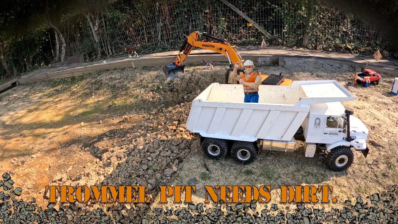 Reloading the trommel pit.  RC fun...