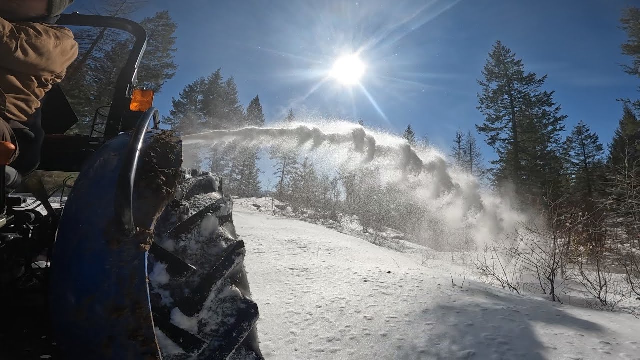 Can my tractor and snowblower handle three miles of snowy mountain road?