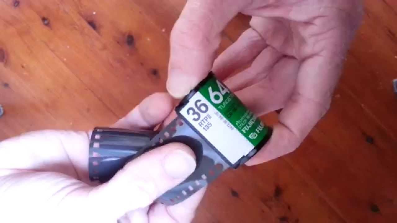 How to retrieve the film leader from film canister