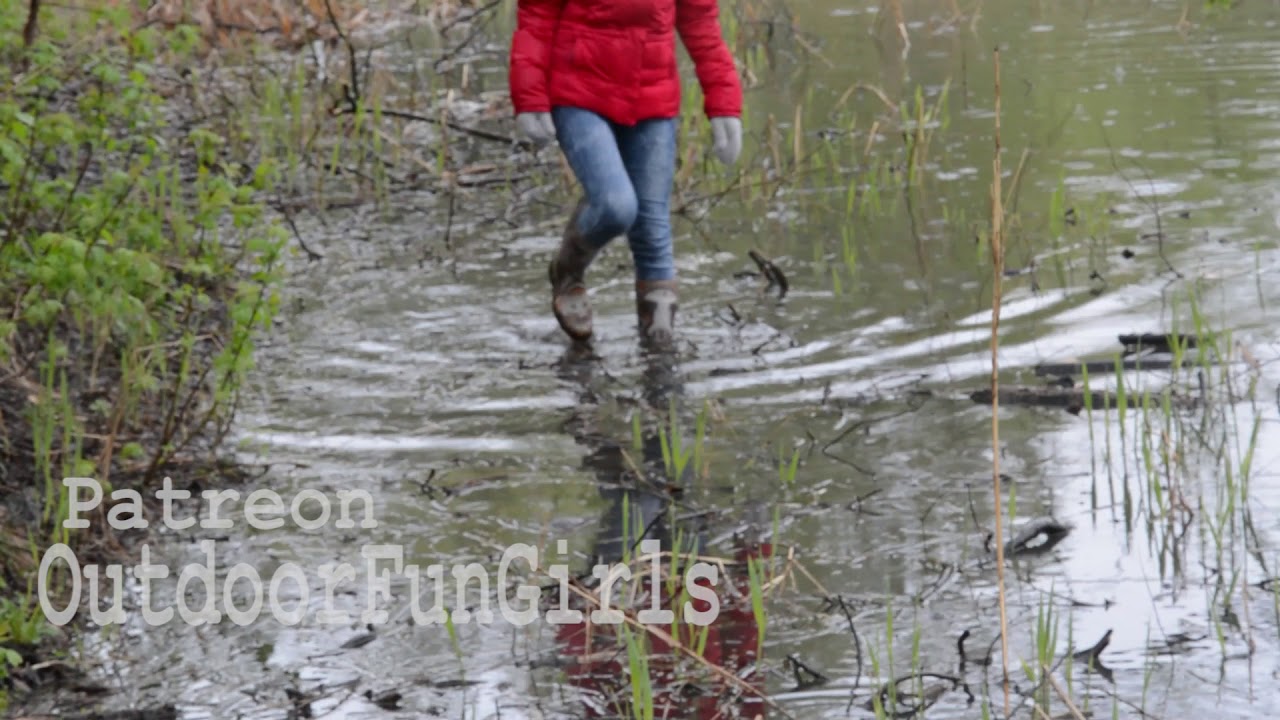 Girl walk in rubber boots
