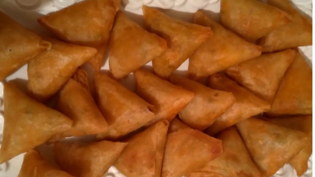 بريوات بصلصة البشاميل والدجاج معلكة ولذيذة