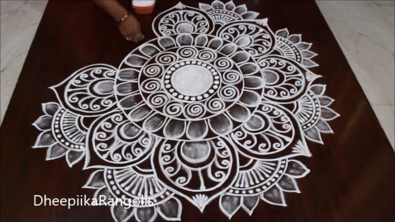 Beautiful freehand rangoli design |easy freehand muggulu | #rangolis #muggulu #rangolidesigns