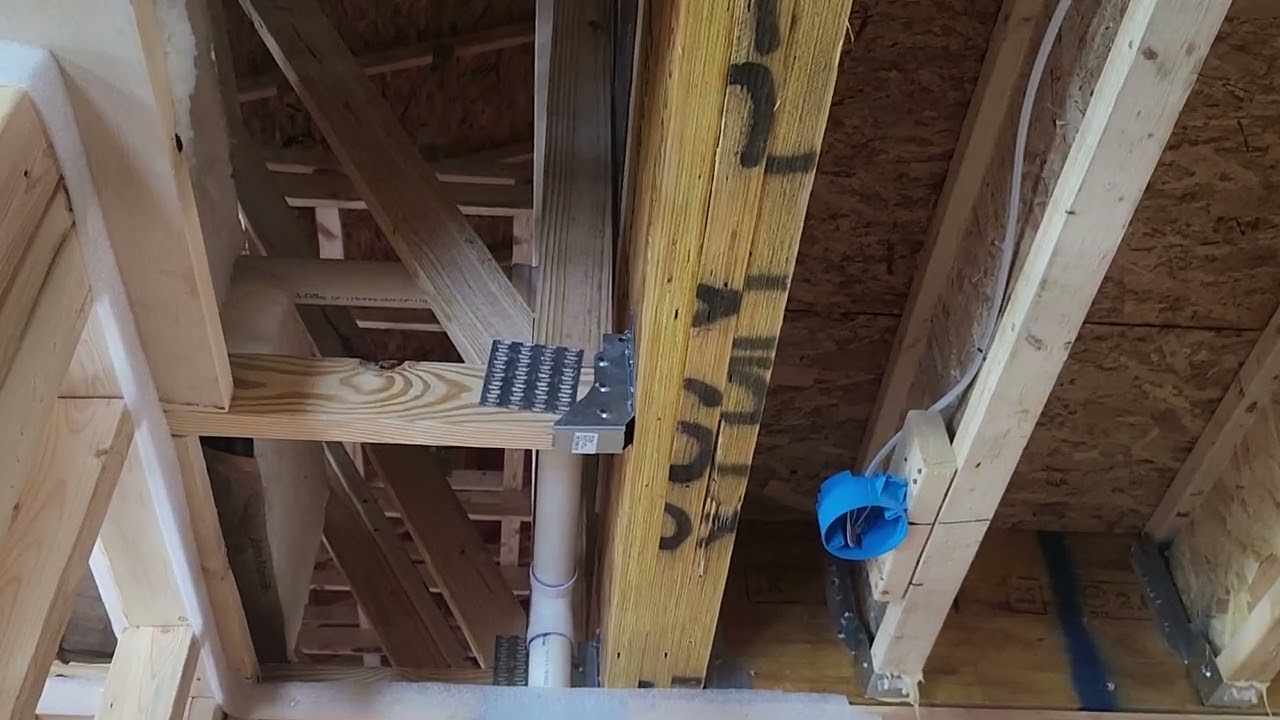 IMPROPER TRUSS HANGER NAILING