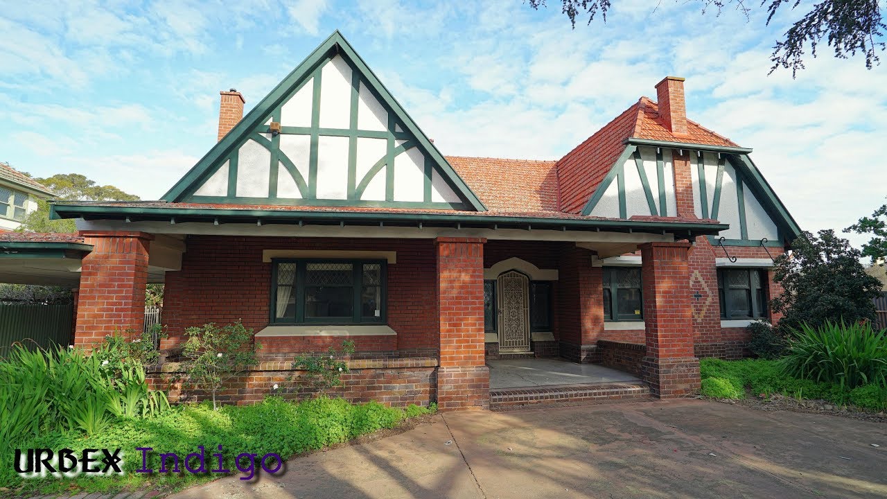 Abandoned- Classic Tudor style home built 1927 detailed features/interiors. Pool with ducks.