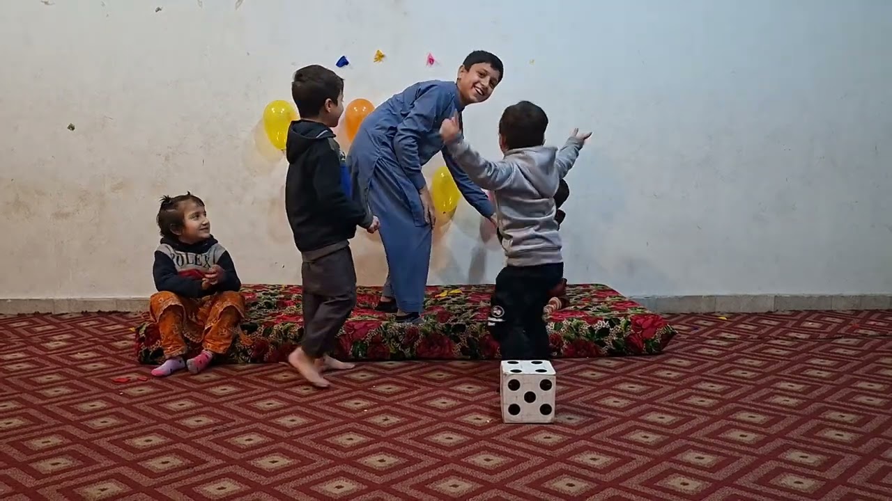 Playing child with baloons tha tha tha