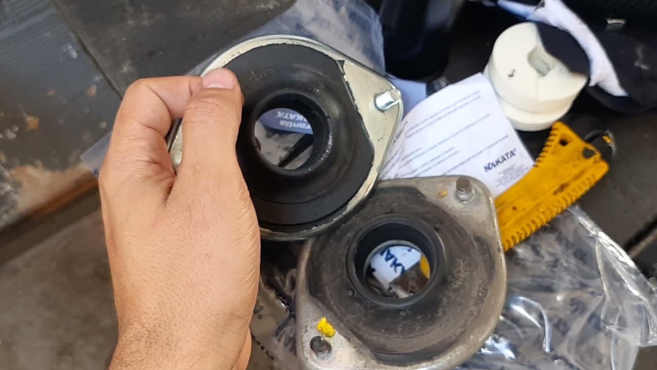 Posição correta do coxim de amortecedor do celta.