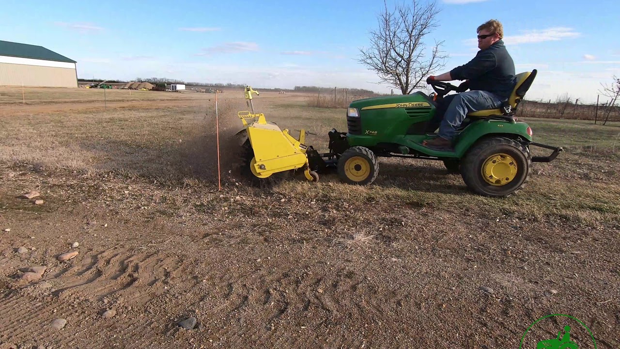 John Deere X748 and 60HD Brooms