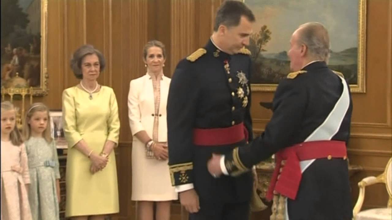 Spain's new king Felipe VI receives the royal sash