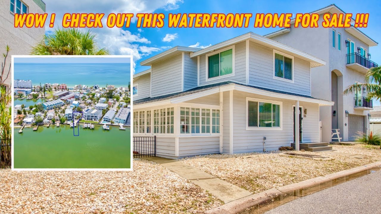 Let's tour this waterfront home for sale in Treasure Island, FL, only steps to the beach!
