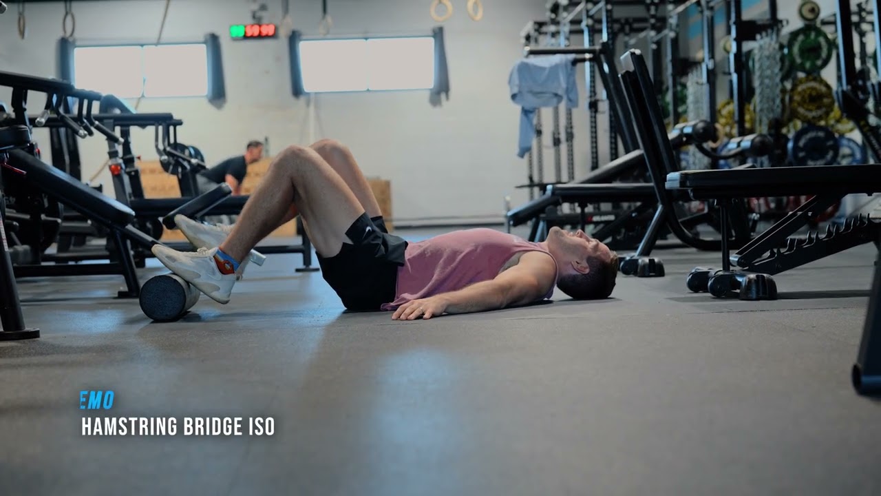 Foam roller hamstring bridge | Movement Demo