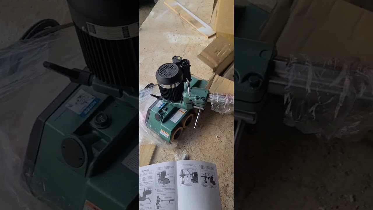 Grizzely G1095 power feeder mounting on powermatic PM2700 shaper.