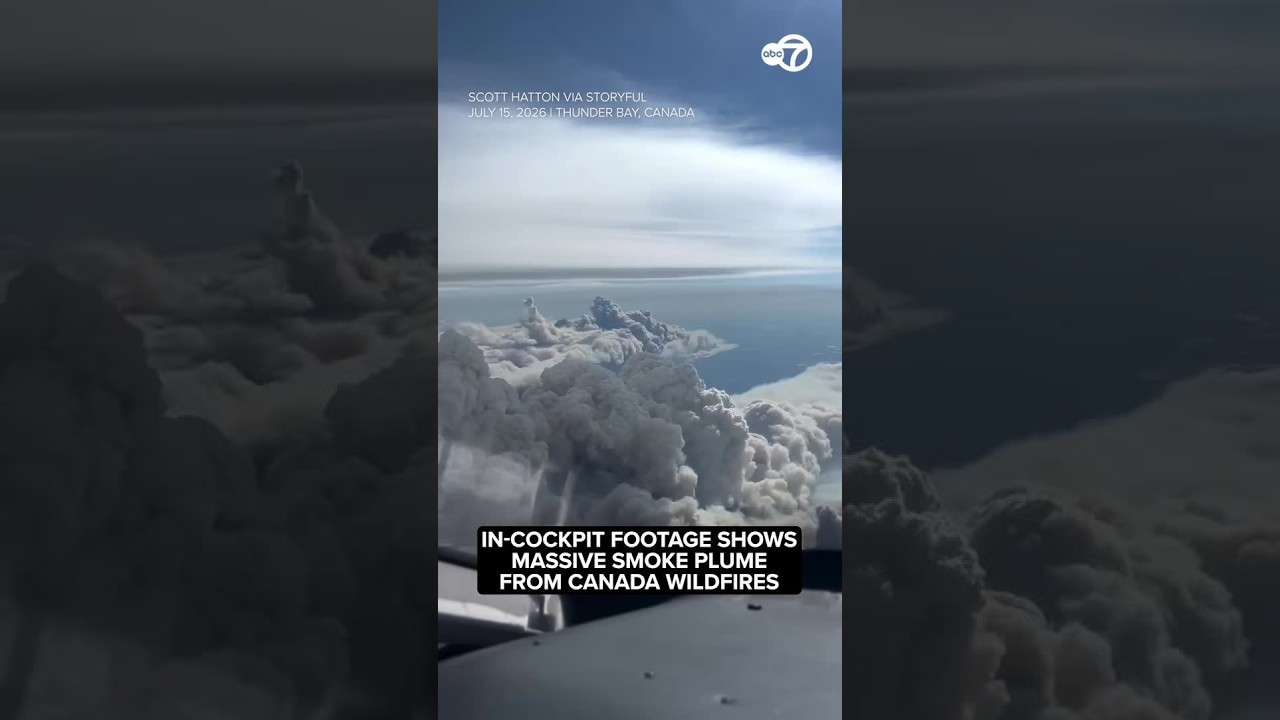 Footage from airplane shows massive smoke plume from Canada wildfires