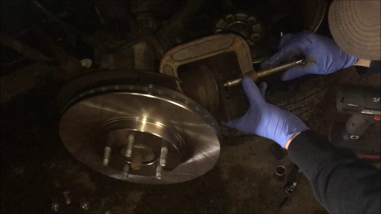 Change front brakes and rotors on a 2006 Ford Taurus