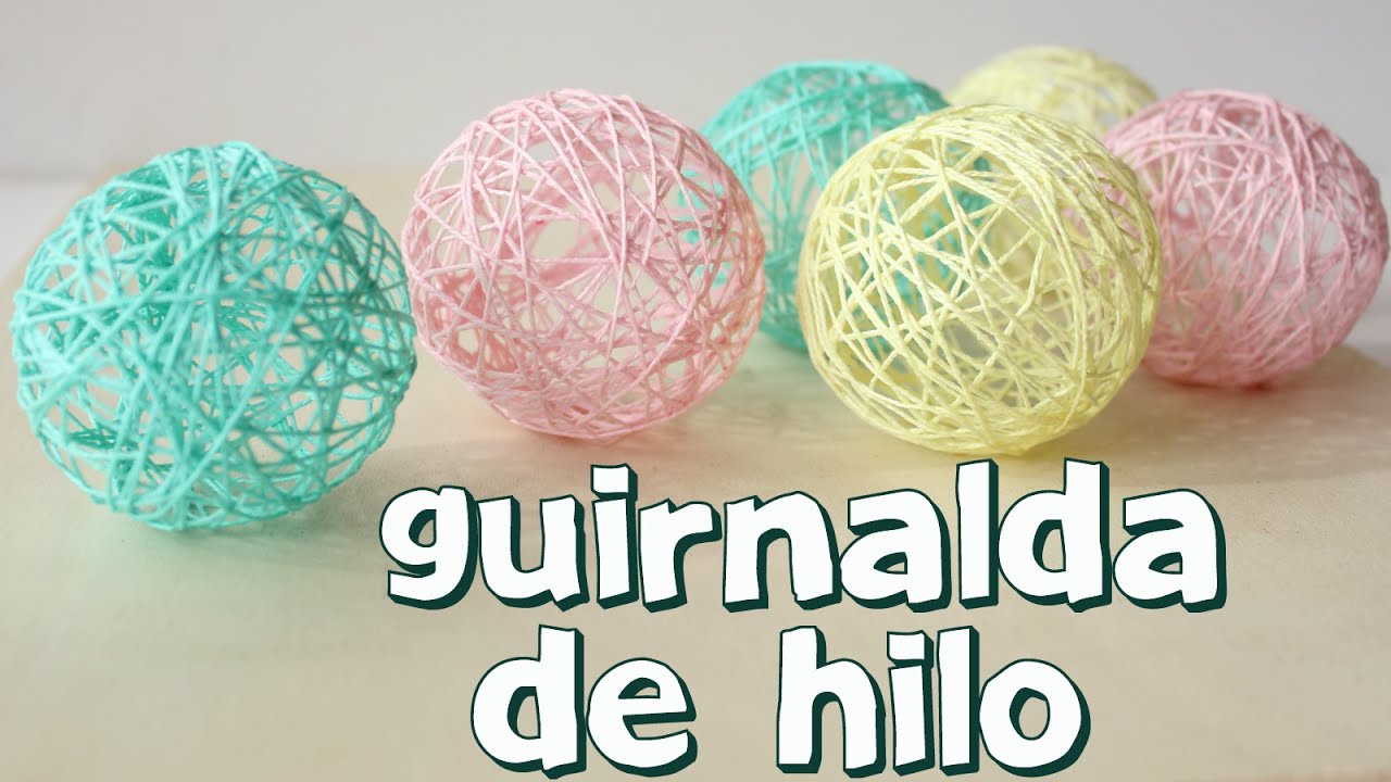 Cómo hacer una guirnalda con bolas de hilo