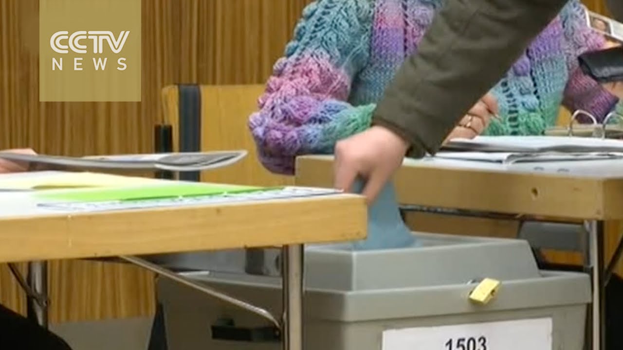 Merkel faces test as &lsquo;Super Sunday&rsquo; regional elections begin in Germany