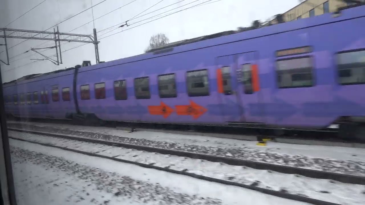 Resa med Snälltåget från Eslöv till Lund C i snölandskap, Februari 2026